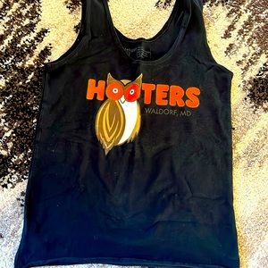 New hooters uniform. Size S. Location on front.